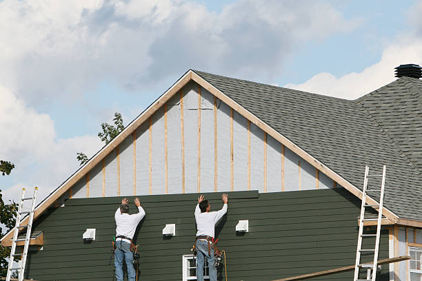 Professional Siding Repair technician working in Hague, VA